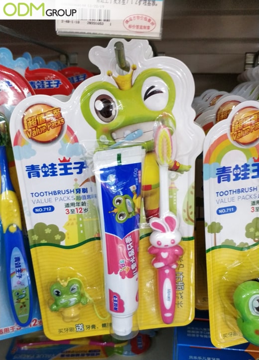 Colorful on pack promotion with plastic toy and a toothbrush